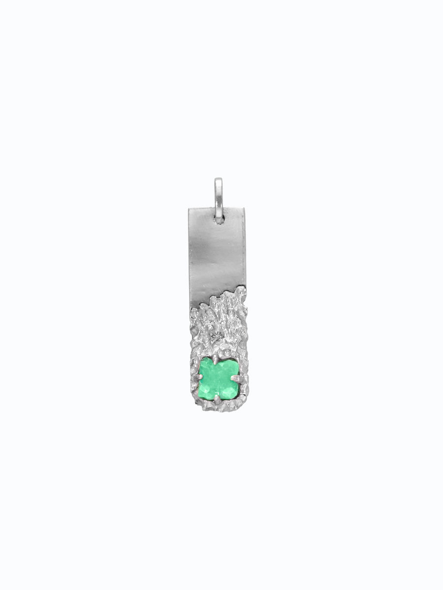 Dije de oro blanco 18k con esmeralda en bruto