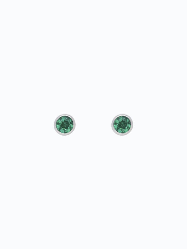Aretes de oro blanco con esmeralda redonda de 0.30ct