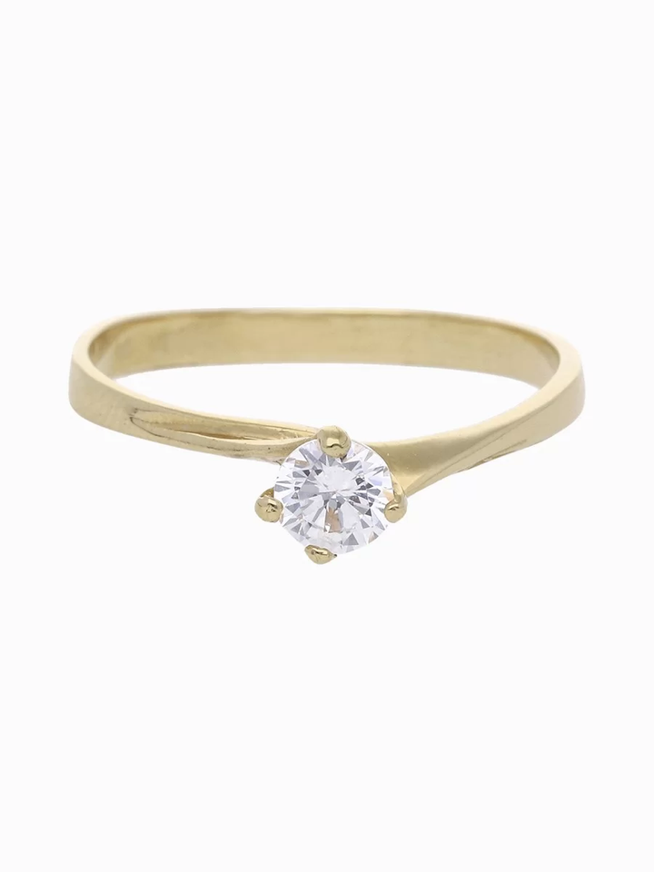 Anillo de oro 18k con anillo de compromiso en oro de 18k con zirconita. Fondo neutro, piedra central visible, ideal para c...