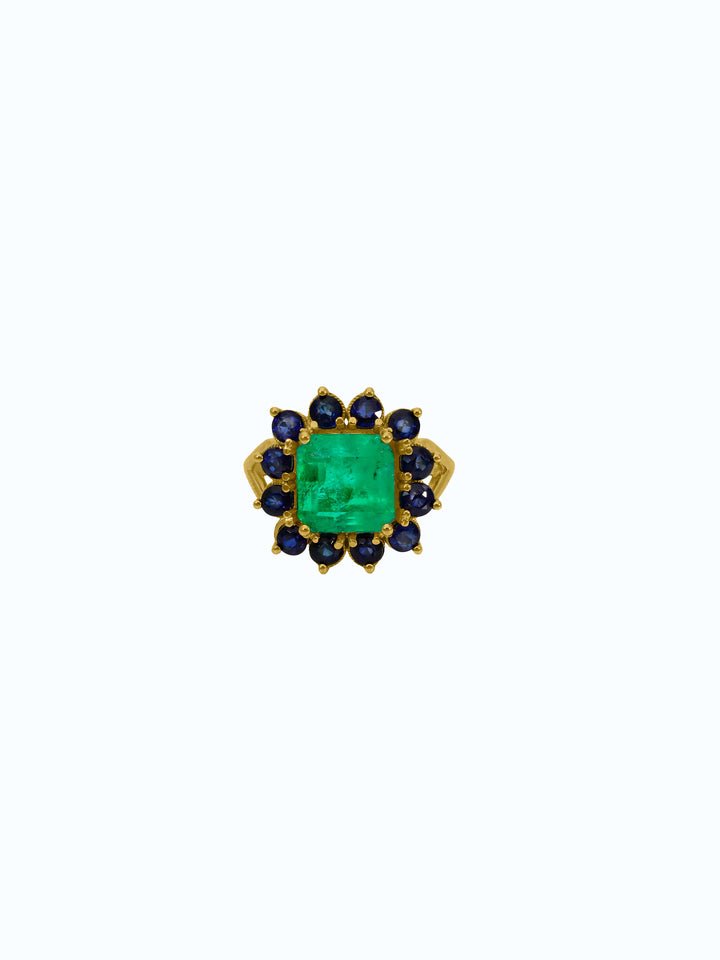 Anillo de oro 18k con esmeralda y zafiros 