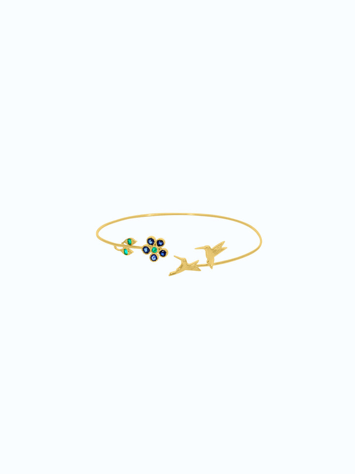 pulsera de oro 18k con zafiros y esmeraldas diseño colibrí