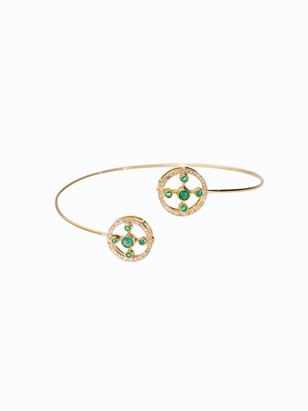 Pulsera de oro 18k diseño aro de cruz con esmeraldas y diamantes